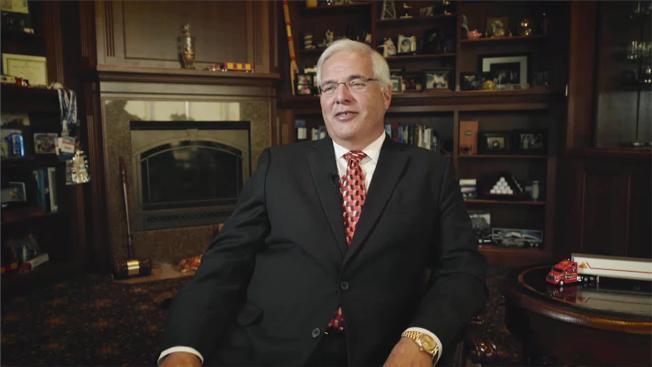 Decker Companies chairman in his office