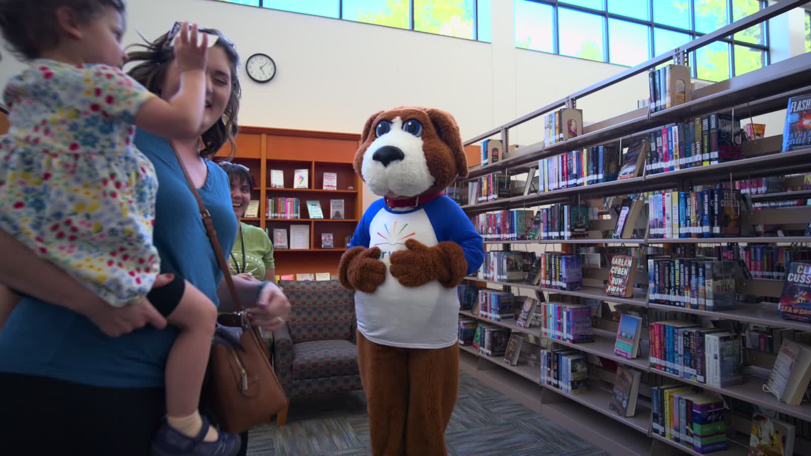 Norwalk Public Library, patrons in the stacks