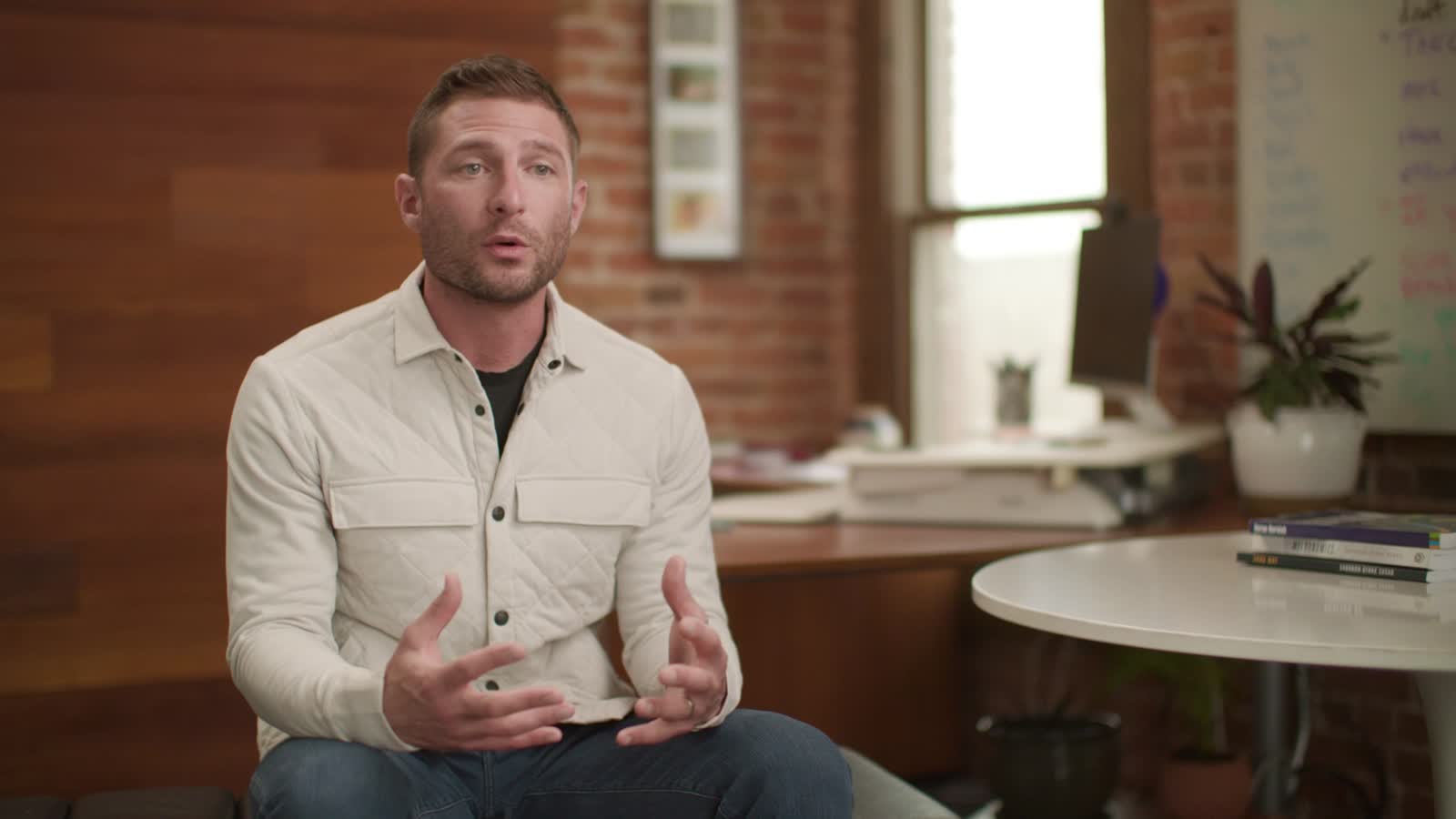 PlanOmatic, employee interview in a brick office