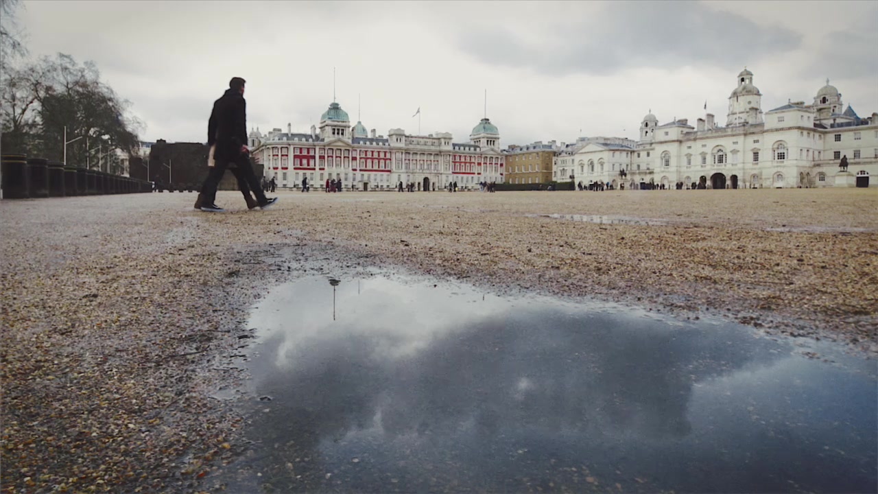 Horse Guards Parade reflected in a puddle, London